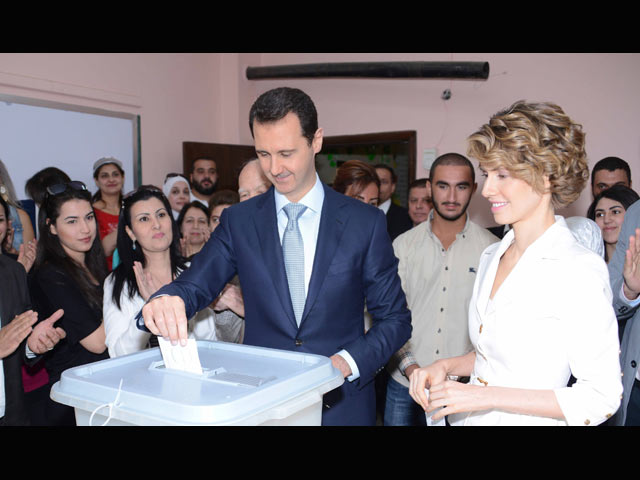 Башар Асад на избирательном участке в Дамаске. 3 июня 2014 года