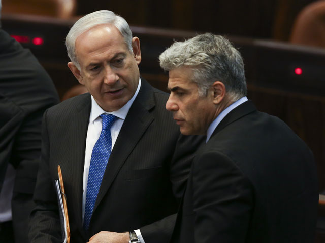 Премьер-министр Биньямин Нетаниягу (лидер "Ликуда") и Яир Лапид (лидер "Еш Атид")