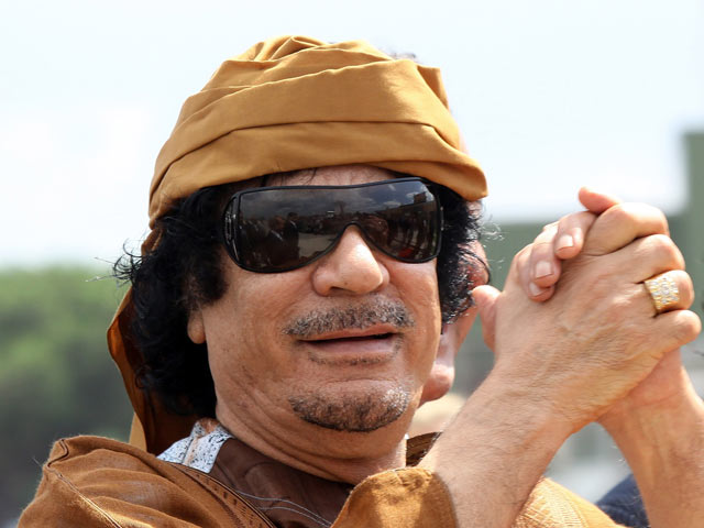 Муаммар Каддафи в 2010 году