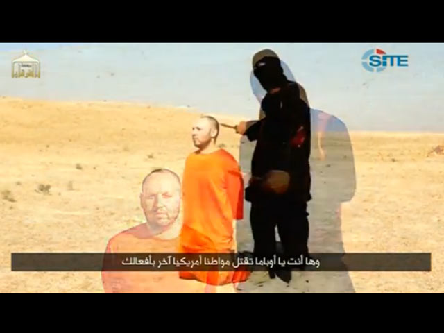 Кадр видеозаписи казни Стивена Сотлоффа, распространенной боевиками "Исламского государства" 2 сентября 2014 года