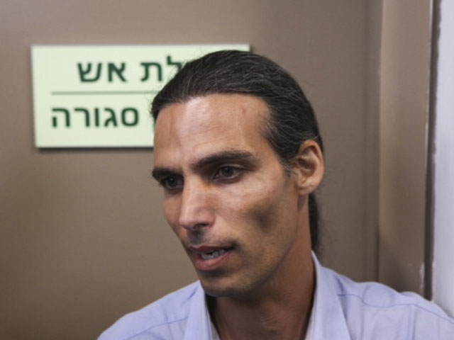 Игаль Рацон, сын Гоэля Рацона в окружном суде Тель-Авива. 28 октября 2014 года