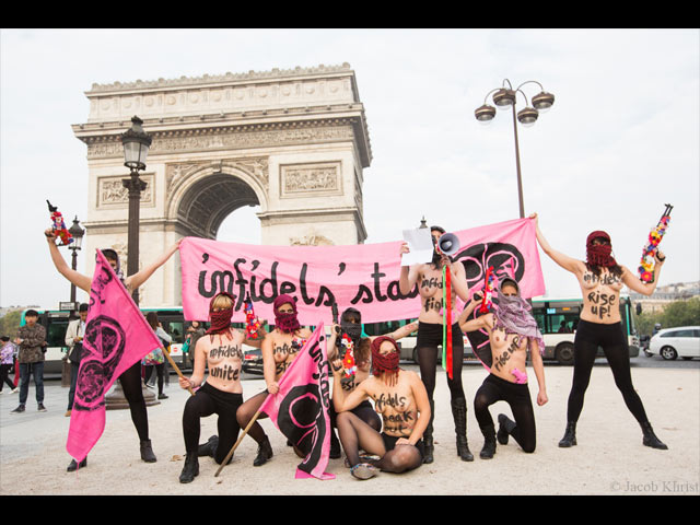 Акция FEMEN около Триумфальной арки и посольства Катара. Париж, 24 сентября  2014 года