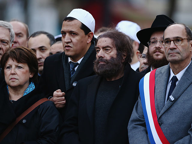 Имам Хасен Шальгуми и философ Марек Халтер в шествии против террора