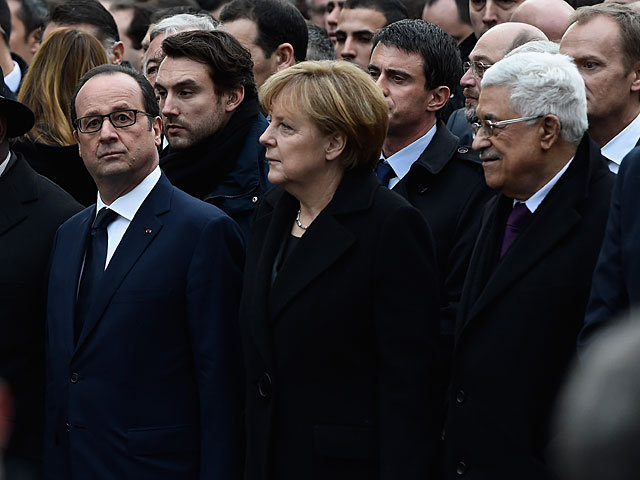 Канцлер Германии Ангела Меркель принимает участие в "Республиканском марше". Париж, 11 января 2015 года