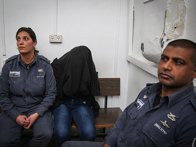 Подозреваемая в поджоге квартиры в здании суда. Иерусалим, 2 февраля 2015 года
