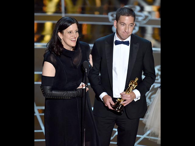 Патрик Осборн и Кристина Рид на церемонии вручения премии "Оскар" 