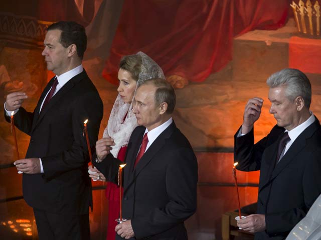Медведев, Путин и Собянин в храме Христа Спасителя в Москве. 12 апреля 2015 года