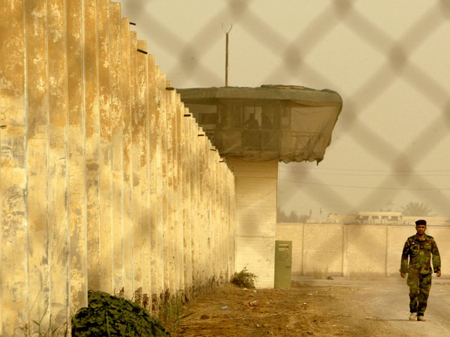 Десятки погибших в ходе побега из иракской тюрьмы   