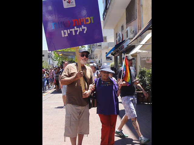 Участники "Парада гордости" в Тель-Авиве. 12 июня 2015 года