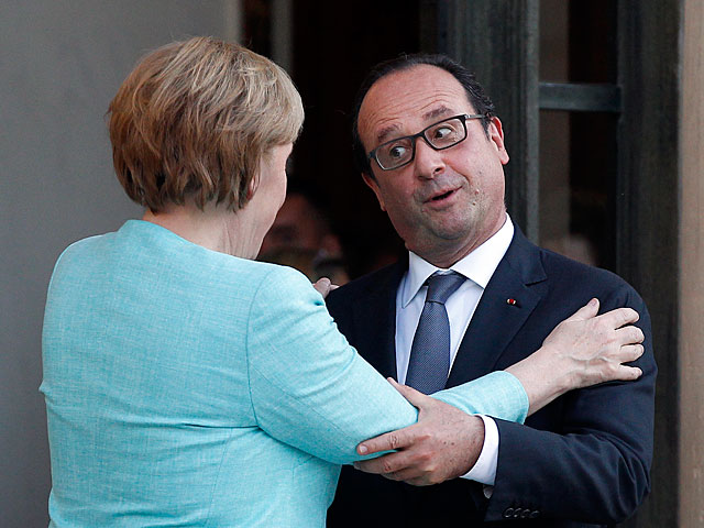Франсуа Олланд и Ангела Меркель достигли согласия по вопросу о системе распределения мигрантов на территории Европы