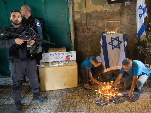На месте теракта в Иерусалиме. 8 октября 2015 года