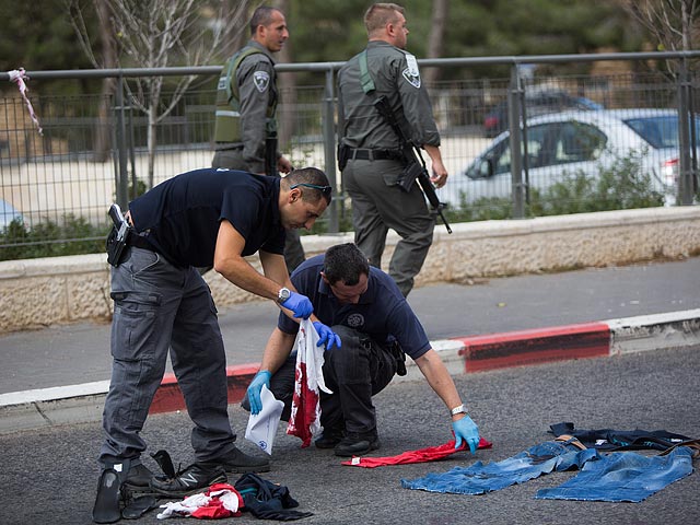 На месте теракта в Гиват а-Тахмошет в Иерусалиме. 30 октября 2015 года