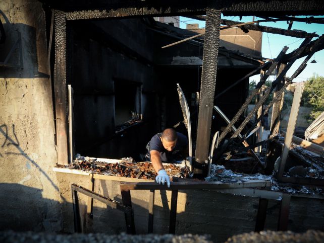 Сгоревший дом семьи Дауабше в деревне Дума   