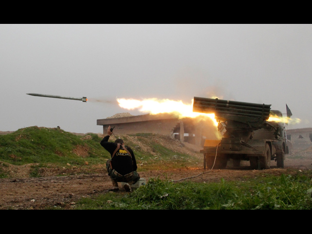 Пуск ракет реактивной системой залпового огня калибра 122 мм "Град" (архив, фотография из Сирии, не из Газы)