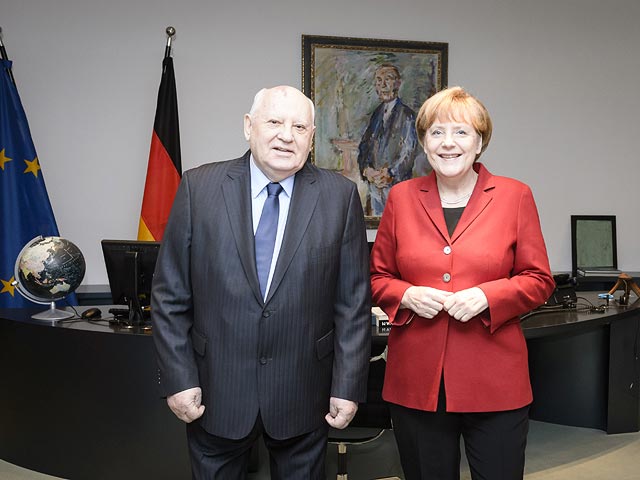 С Ангелой Меркель в 2014-м