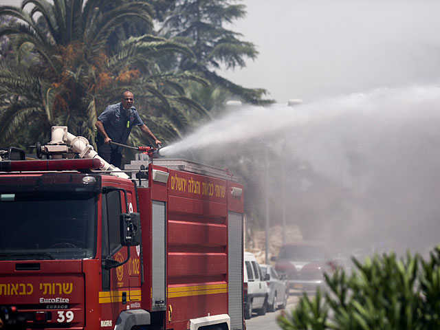 На месте пожара в районе Рамот. 26 мая 2016 года