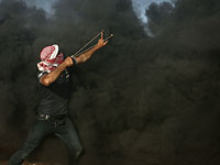 Жители Газы планируют сжечь тысячи покрышек перед прорывом границы