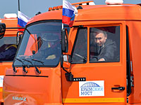 Путин за рулем КАМАЗа открыл движение по Крымскому мосту