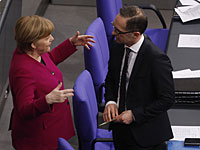 Канцлер Ангела Меркель и глава МИД Германии Хейко Маас