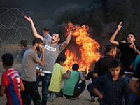 Массовая акция протеста проходит в секторе Газы возле КПП "Эрез"