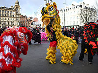 Китайский Новый год: драконы и львы на улицах Глазго. Фоторепортаж