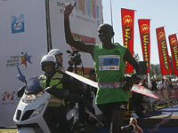 Рональд Кимели Кургат финиширует в 2014 году