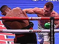 Бокс: в объединительном бою Сауль Альварес победил Дэниэла Джейкобса