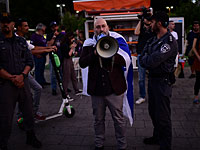 В Тель-Авиве проходит акция протеста, участники которой требуют снять блокаду с Газы