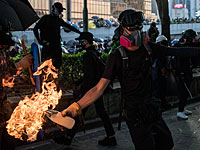В Гонконге продолжается противостояние: коктейли Молотова против слезоточивого газа 