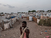 Лагерь беженцев в Адене, Йемен. Большая часть лагеря состоит из семей, которые бежали от военных действий вдоль западного побережья Йемена