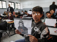 "Я - Муаз Амарне": палестинцы фотографируются с повязкой на глазу