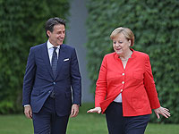 Премьер-министр Италии Джузеппе Конте и канцлер Германии Ангела Меркель