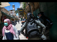 Израиль в масках: коронавирус отступает. Фоторепортаж
