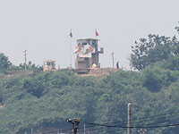 Северокорейская пограничная вышка неподалеку от межкорейского офиса связи в Кэсоне, 16 июня 2020 года