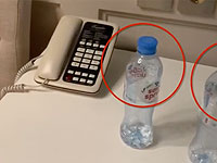 "Проект" и ФБК: Навального отравили до поездки в аэропорт, яд нашли на бутылке "Святой источник" из отеля