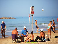 Нельзя, но можно? Солнечный февральский день на пляже в Тель-Авиве. Фоторепортаж