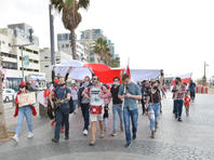 В Тель-Авиве состоялась акция солидарности с Беларусью под бело-красно-белым флагом