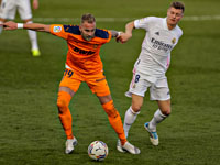 Урош Рачич (в оранжевом) в матче против "Реала"