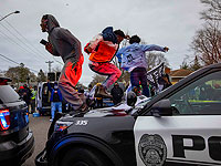 Беспорядки в Миннесоте после того, как полицейские застрелили афроамериканца. Фоторепортаж