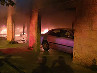 В Хайфе на стоянке загорелись автомобили, пострадали около 60 человек