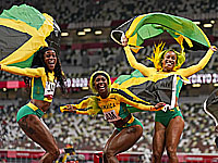 Олимпиада. Эстафета 4 по 100 метров. Победителями стали сборные Ямайки и Италии