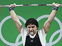 Олимпиада. Тяжелая атлетика. Спортсмен из Катара установил два олимпийских рекорда