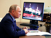 Владимир Путин в своем рабочем кабинете