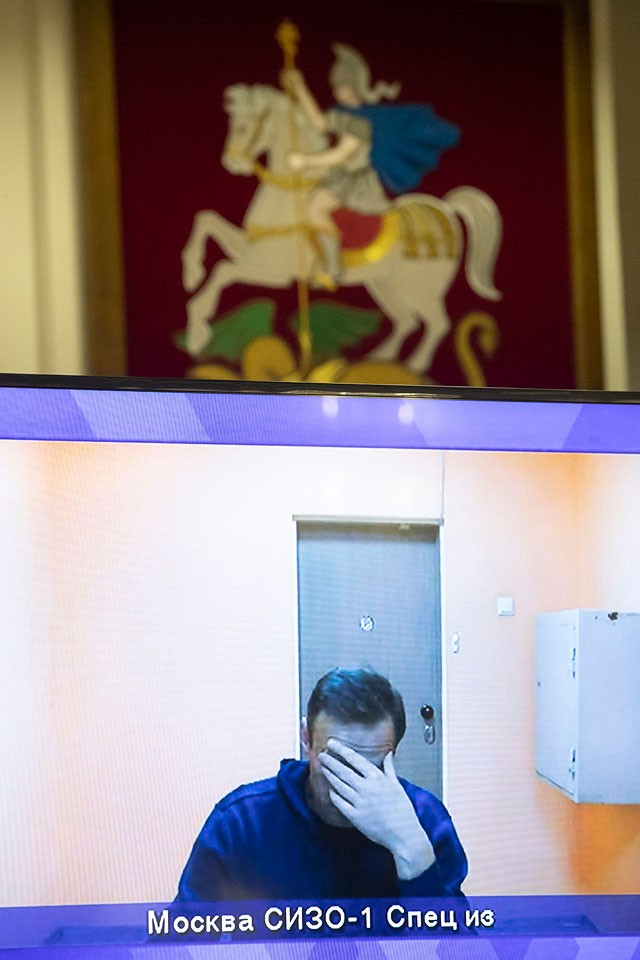 Алексей Навальный во время слушания его апелляции в суде Москвы, 28 января 2021 года. Навальный был заключен под стражу после возвращения в Москву после реабилитационного курса в Германии.