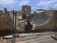 Разрушение построек в районе Кфар Шалем (южный Тель-Авив) в июле 2018 года