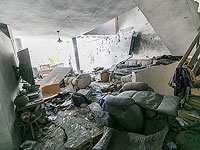 Дом в Ашкелоне после попадания ракеты выпущенной и сектора Газы