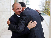Президент России Владимир Путин (слева) обнимает президента Сирии Башара Асада в резиденции "Бочаров Ручей" на черноморском курорте Сочи, Россия, 2017 год