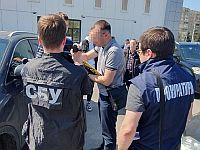 Полиция: во Львове задержаны экс-чиновник и журналист, подозреваемые в торговле "гуманитаркой" и присвоении помощи для ВСУ