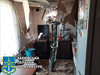 Фото дня: российский снаряд на кухне жилого дома в Харьковской области