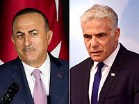 Министр иностранных дел Турции Мавлют Чавушоглу и министр иностранных дел Израиля Яир Лапид